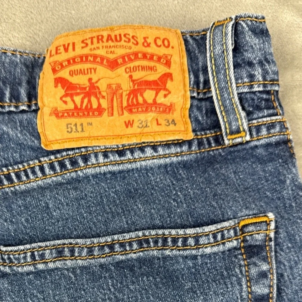 Levis 511 Slim Fit Jeans Mens 31x34 Medium Wash Blue Denim Zip Fly Classic